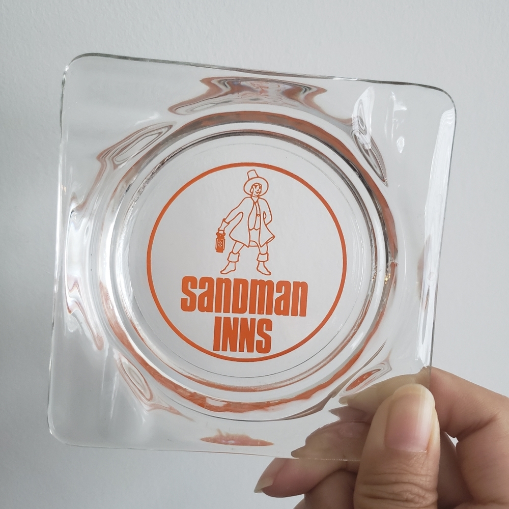 Sandman Inns orange logo glass ashtray
